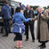 Bishop Victoria thanks one of the dozens of students who've turned out to help Kaiapoi in its days of crisis.