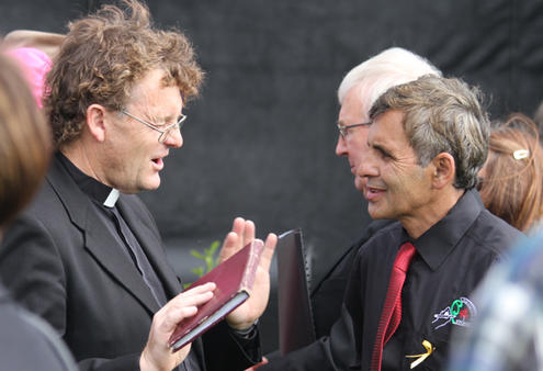 After the memorial service, Tim Mora mingled with the crowd.