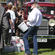 Mourners lined up to take a piece of coal and place it in the tray of the vintage Whippet truck - registration number: Our 29.