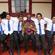 Some of the guys from the Waitara High School kapa haka troupe kick back with the Archbishop at Owae Marae.