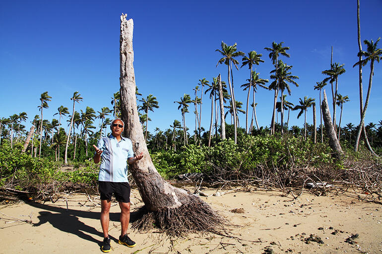 Archbishop Winston Halapua at Pangaimotu Island, in Tonga. He fished here as a boy - and now sees the island slowly dying from rising salt water.