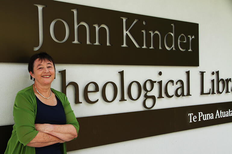 Judith Bright outside the library she has served for 40 years.