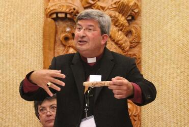 Archbishop Roger Herft wove his keynote address around considerations of the digital memory stick - and the Aboriginal message stick.
