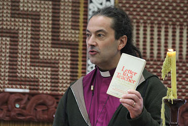 Bishop Justin brandishes the book which rocked the education world - and which has shaped thinking about social class and schools.
