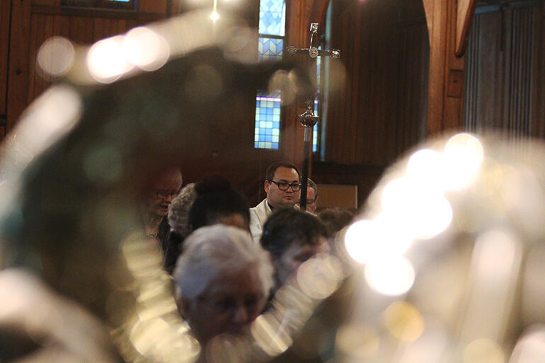 Rev Ivica Gregurec, the Holy Trinity Cathedral Precentor, leads the procession into St Mary's.