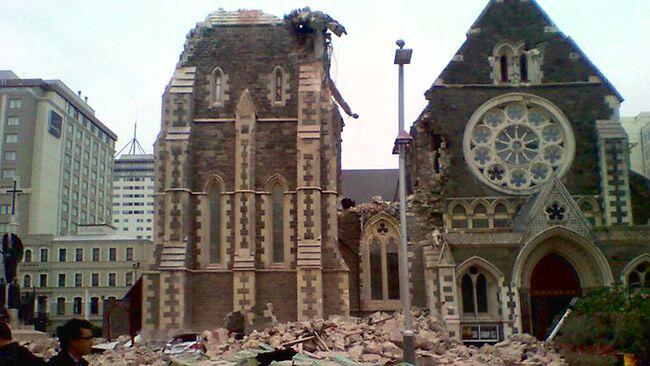 Christchurch Cathedral is surrounded by the rubble of its own spire. Photo: The Press