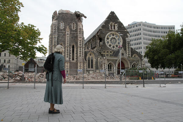 Bishop Victoria Matthews surveys the ruined tower of her cathedral. Photo: Lloyd Ashton