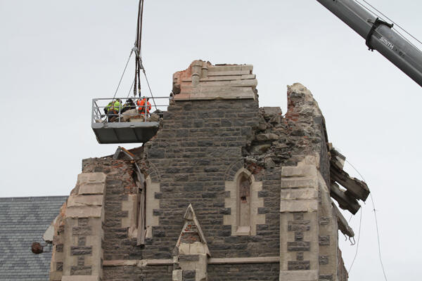 Rescue workers prepare to inspect the ruined interior of ChristChurch Cathedral. Photo: Lloyd Ashton