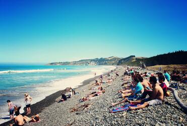 Festival-goers take time to check out Gore Bay itself. Their festival was staged in a farm paddock just up the hill.