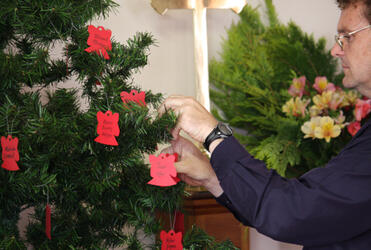 The Cobden-Runanga Vicar Tim Mora and his wife Nikki decorate their tree with 29 angels, for the lost 29 miners.
