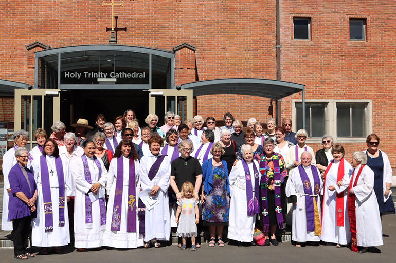 Solidarity, and joy in togetherness - outside Auckland's Holy Trinity Cathedral.