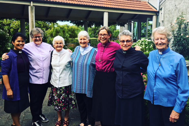 Women priests gathered outside St Peter's Cathedral in Hamilton.