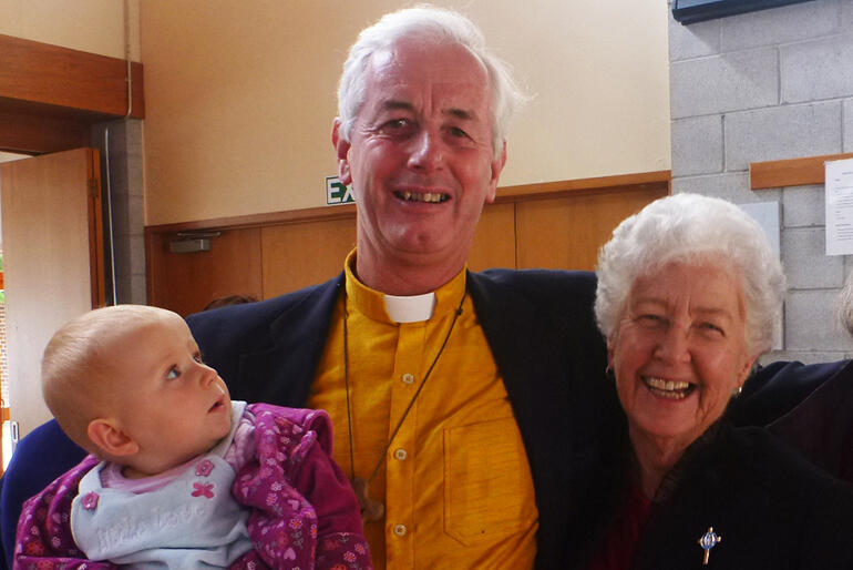 Mike Hawke at the 2014 Mother's Union conference, with MU President Margaret Wilson, and a curious observer.