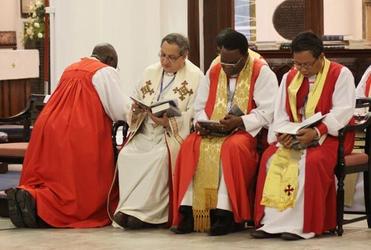 Archbishops at prayer during the Global South opening service in Singapore.