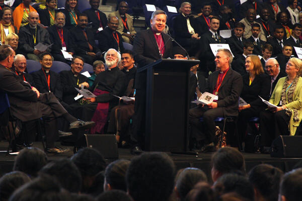 Archbishop David raises a chuckle from the Archbishop of Canterbury during the powhiri for the Anglican Consultative Council.