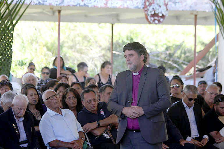 Archbishop Philip Richardson pays his respects at Kauaetangohia.