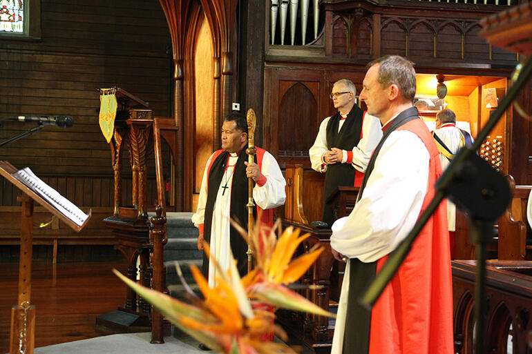 The gift given, the three northern bishops reflect. From left: Bishop Kito, Bishop Jim White and Bishop Ross Bay.