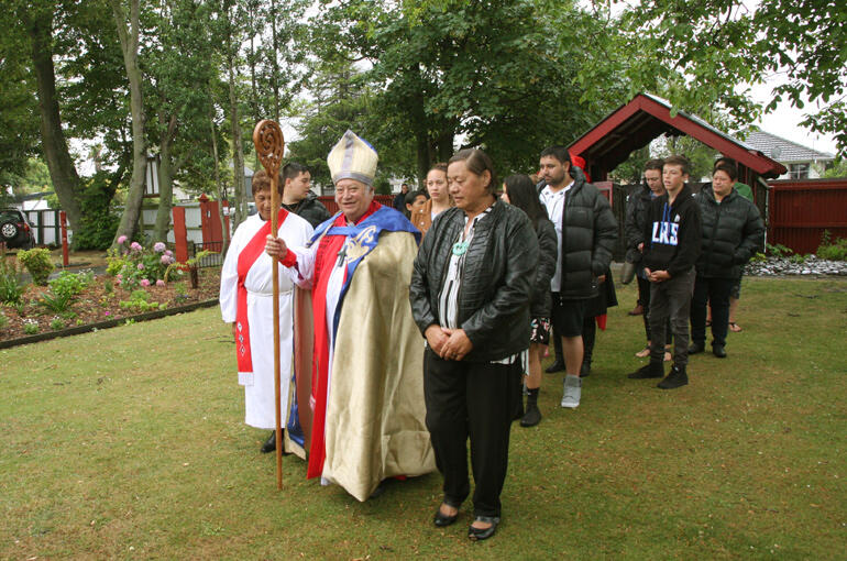 Bishop Richard, alongside his wife, Mere, being called on.