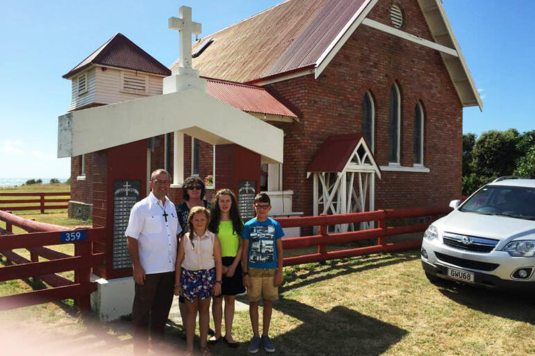 Bishop Andrew Hedge and whanau outside Patoromu Church, Whangara.
