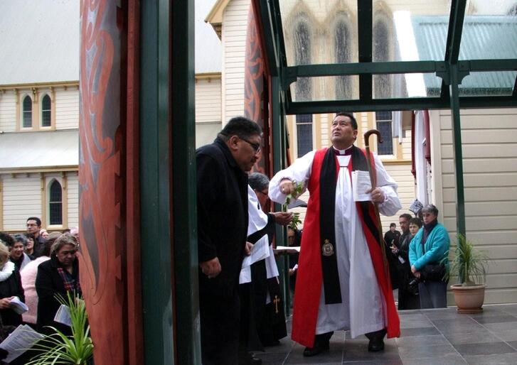 Bishop Kito Pikaahu blesses the new entrance to Tatai Hono marae.