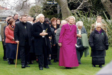 Bishop Victoria and Dean Peter Beck lead the diocesan party on to the marae.