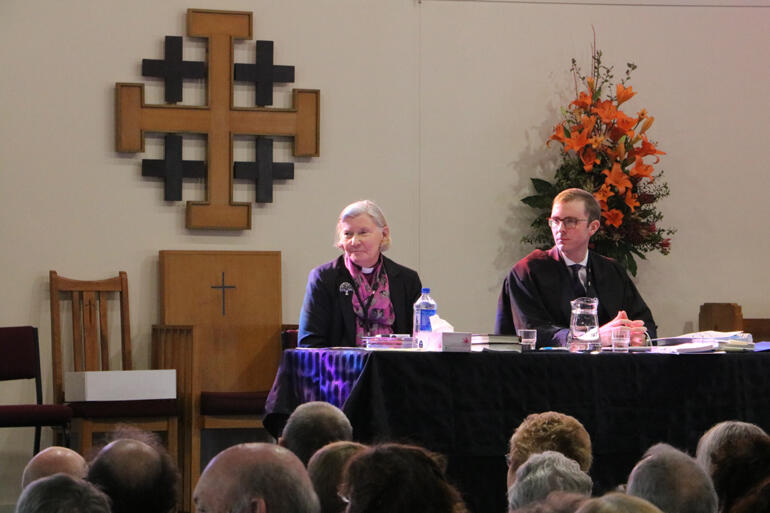 Bishop of Christchurch Victoria Matthews and Diocesan Chancellor Jeremy Johnson listen as synod debates cathedral options.