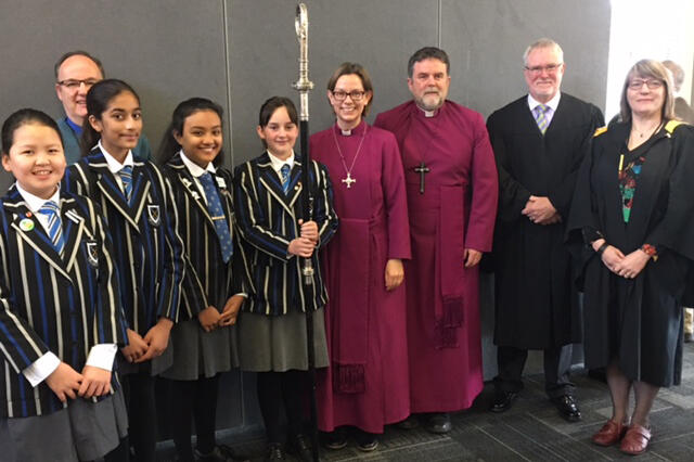 The bishops with (among others) Southwell students Maddison Hansen, Shanan Saju, Nicole Chen, and Bahaar Mahal.