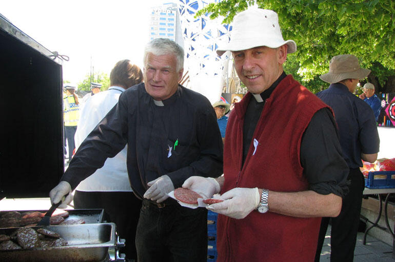 Foretaste of the Great Banquet: John Sheaf and Andrew Starkey feed the cause.