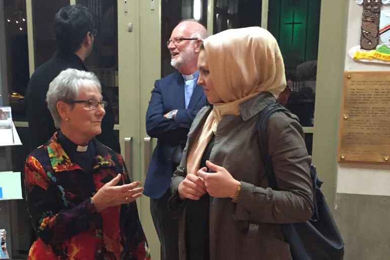 Holy Trinity cathedral co-priest in charge Rev Diane Miller-Keeley talks with Shia Muslim -Christian Council member, Aeliya Hayat.