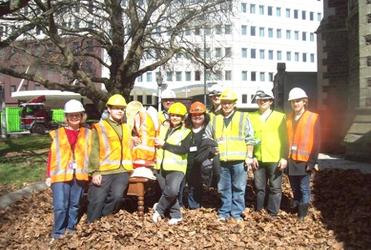 ChristChurch Cathedral's retrieval team poses for a quick photo before venturing into the rubble.
