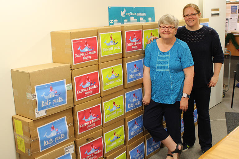 Sue Fallow (left) and Diana Langdon. Kia kaha packs packed, and ready to ship.