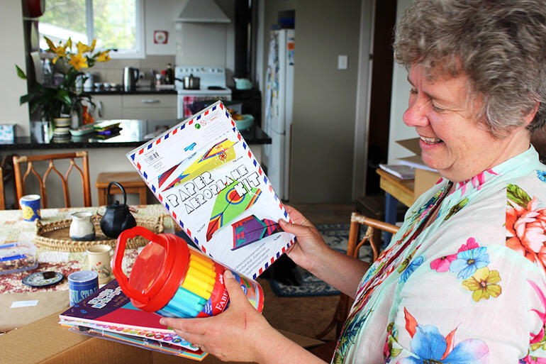 The Rev Dawn Daunauda, Vicar of Awatere, checking out the contents of the Kia kaha packs.