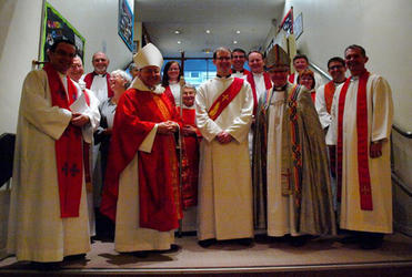 Bishop Tom Brown (right) with Paul McIntosh after his deaconing in Paris.