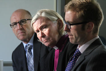 Gary Sellars of Church Property Trustees, Bishop Victoria, and Diocesan Vice-chancellor Jeremy Johnson.