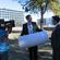 Johnny McFarlane, Project Manager for BECA, with one of the cardboard tubes that will form the cathedral walls.