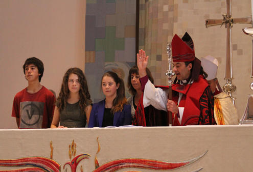 At the end, the Duckworth kids sang a blessing to the congregation - before watching their Dad do the episcopal version.