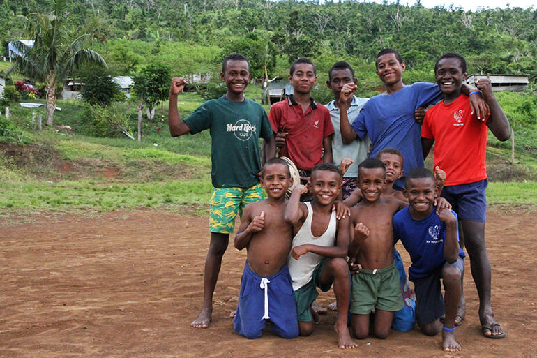 Maniava's young men on their makeshift sports field.