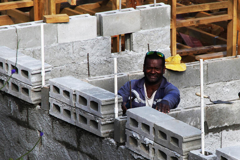 That's Taito Raikidravo from Maniava, working on the new dormitory ablution block.