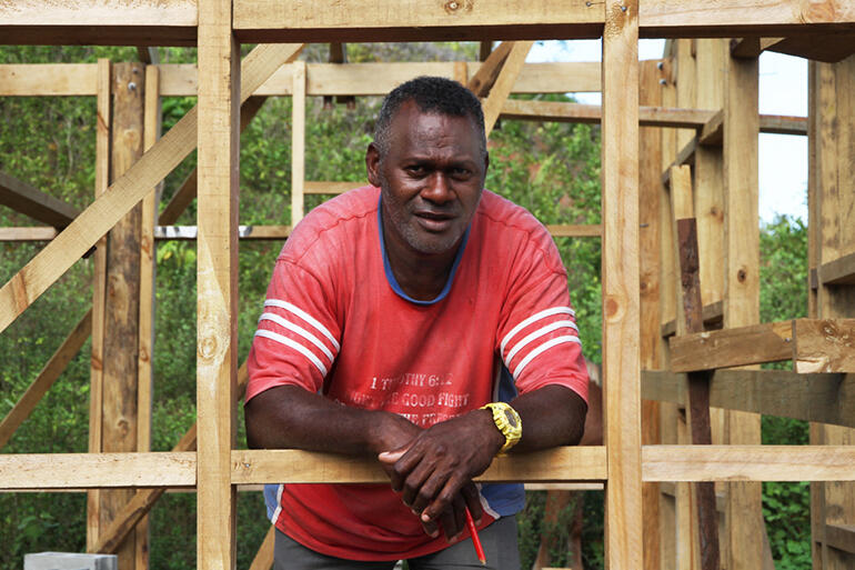 That's Vilikesa Balecala, who's the foreman overseeing the dormitory project. He's also a Suva church pastor.