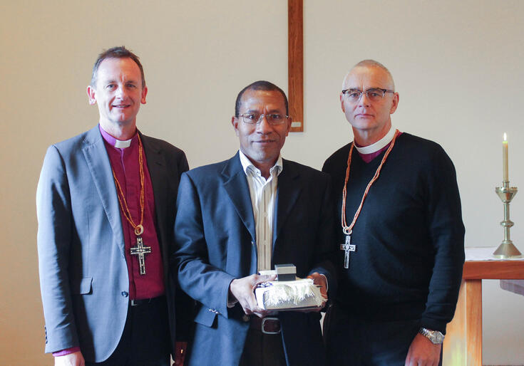 Bishop Ross Bay, Father Aram Oroi and Bishop Jim White.