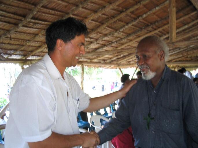 The Anglican Mission Board's Robert Kereopa greets the new Bishop of Popondota in 2006.