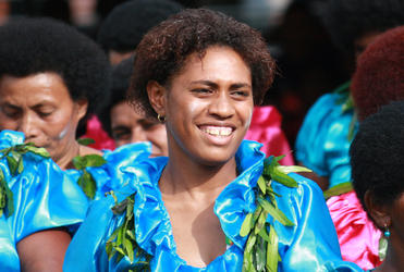 For their sake: One of the women who performed dances of welcome at the Diocese of Polynesia centenary celebrations.
