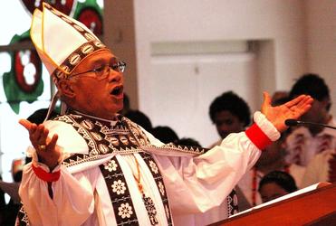 Glory to God, Glory to God, Glory to the Father: Bishop Winston Halapua gathers the community.