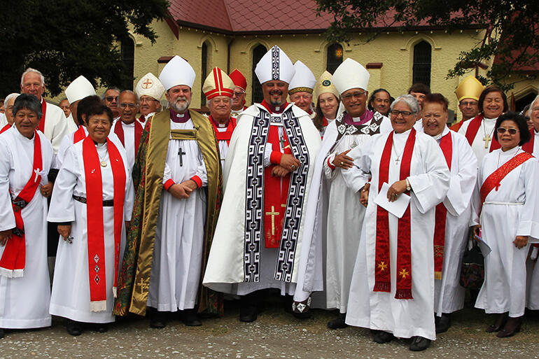 Archbishop Don, flanked by Archbishops Philip and Winston, and a bevy of ordained wellwishers.