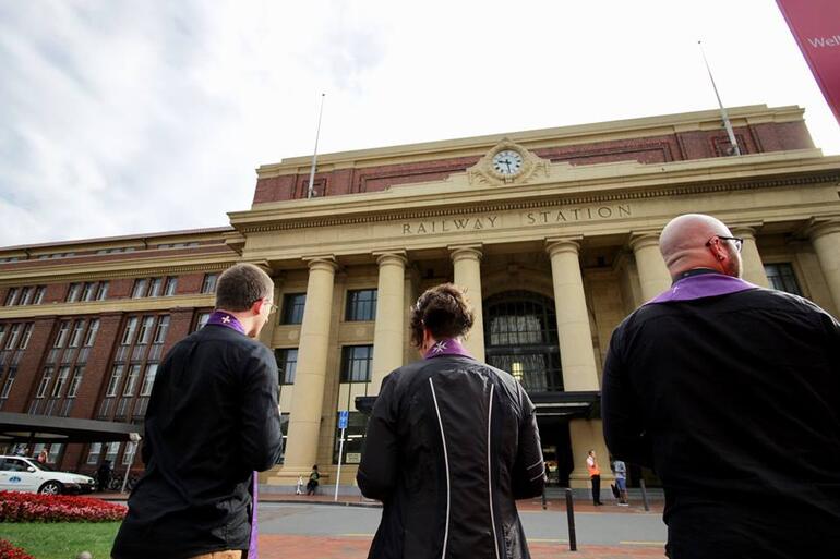 Ready with ashes to go, outside Wellington Station: Revs Scottie, Tric and Joe.