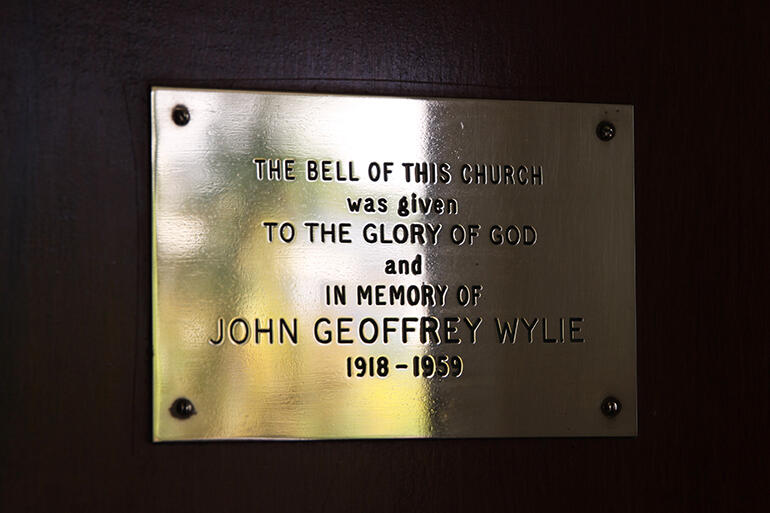 In memory of Geoffrey Wylie - the plaque on the church door which marks the provenance of the bell at St Martin's at St Chad's.