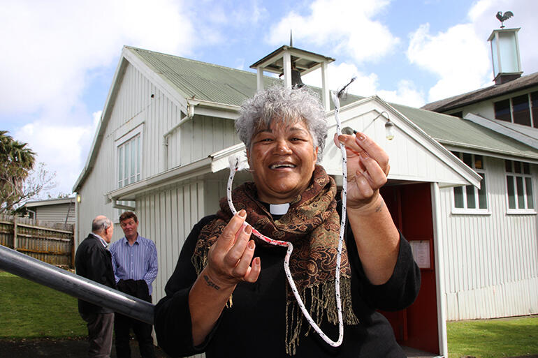 The Rev Jacynthia Murphy, priest in charge at St Martin's at St Chad's, with the remnant of the old bell rope.