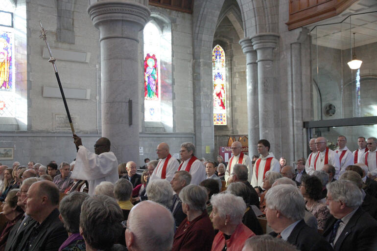 The first of scores of diocesan and visiting clergy process into Christ Church Cathedral.
