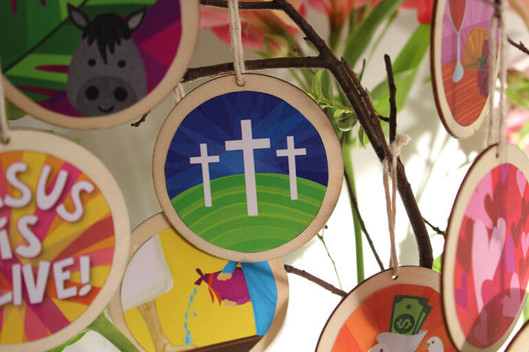 Stickers that follow the Easter story come with wooden disks for children to make into decorations.