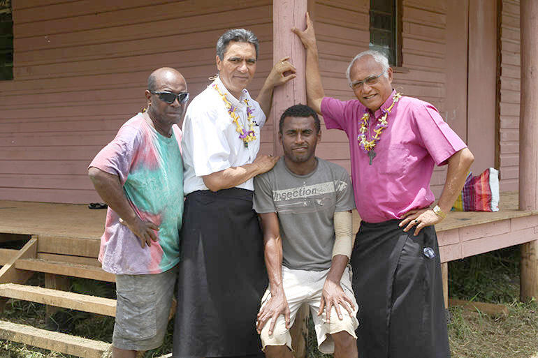 Archbishop Winston, Robert Kereopa and workers at the new dormitory.